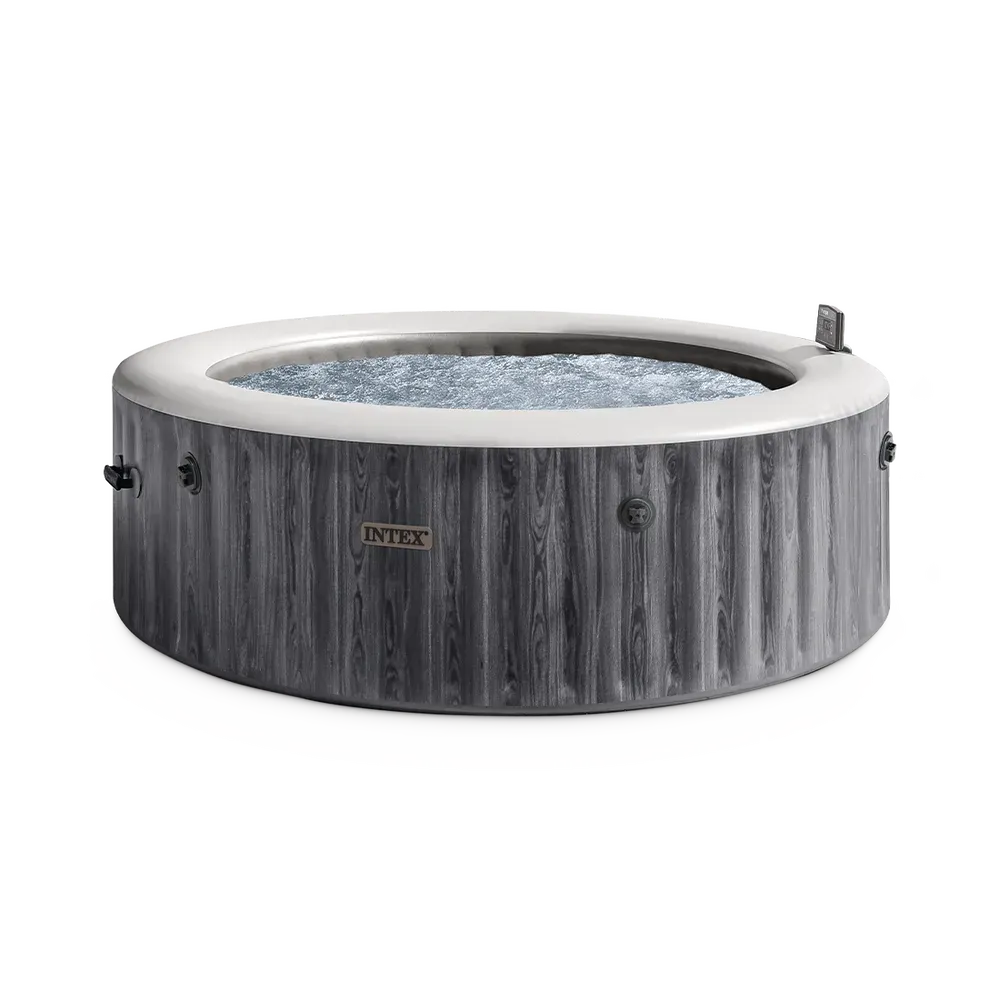 Le spa gonflable Intex PureSpa Baltik 6 places, paroi gris cérusé et bassin en eau, vu de trois quarts